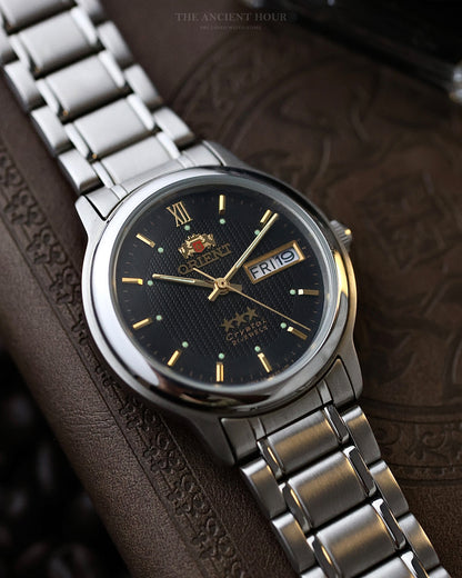 1970s Vintage Orient Tri-Star PM07 Automatic Waffle Textured Black Dial