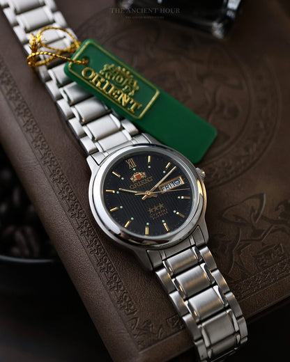 1970s Vintage Orient Tri-Star PM07 Automatic Waffle Textured Black Dial