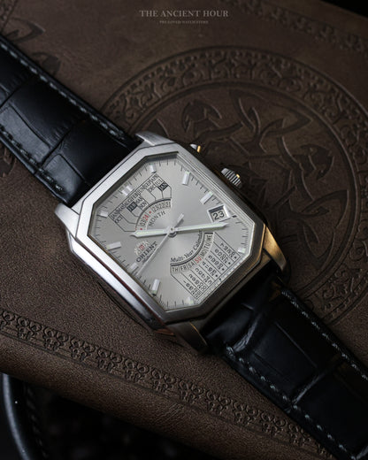 VINTAGE ORIENT MULTI-YEAR CALENDAR FACETED TANK “SUNBURST” SILVER DIAL