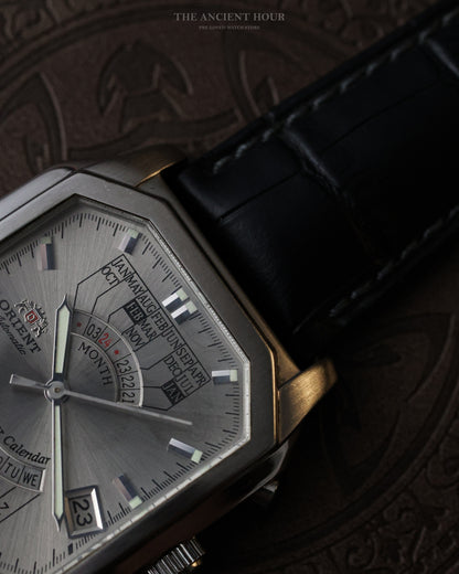 VINTAGE ORIENT MULTI-YEAR CALENDAR FACETED TANK “SUNBURST” SILVER DIAL