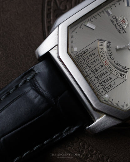 VINTAGE ORIENT MULTI-YEAR CALENDAR FACETED TANK “SUNBURST” SILVER DIAL
